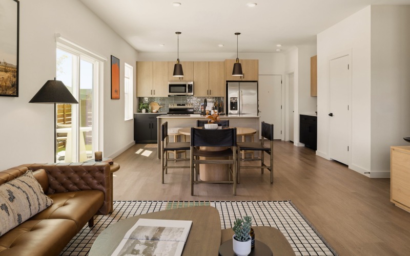 an open kitchen and living room in a rental townhome